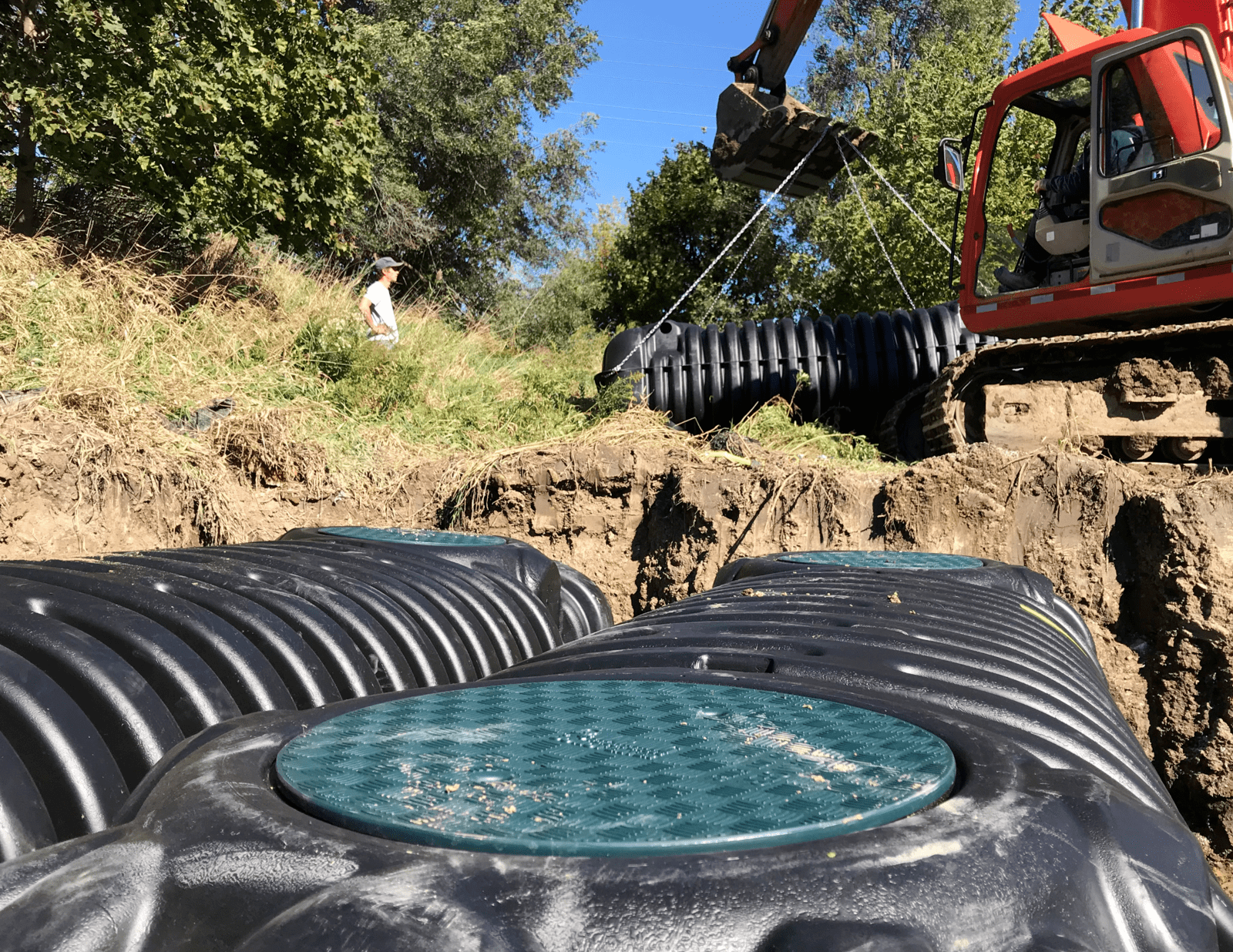 Tank Hoisting into Excavation Trench